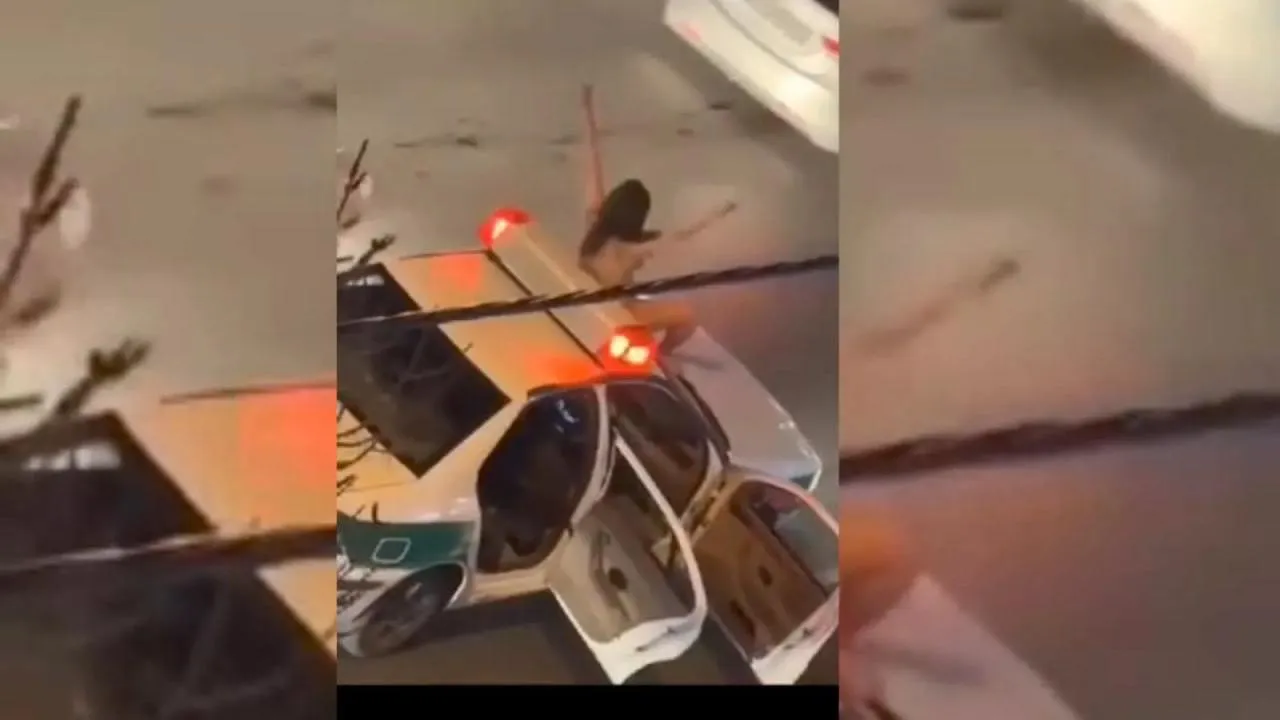  جزئیات برهنه شدن یک زن روی ماشین پلیس در اتوبان صیاد شیرازی مشهد از زبان همسر او 