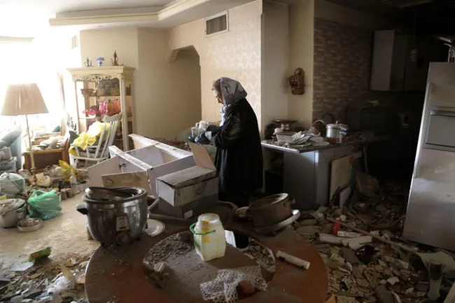 تصاویر خبرگزاری فرانسه از ویرانی خانه‌ای در تهران