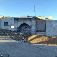  سردر گرمابه تاریخی پیرحصار زیر آوار نخاله‌های ساختمانی / اثر ثبت ملی پاتوق معتادان شد!